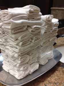 Conference hotel bathroom. Instead of keeping the paper towels stocked, some minimum wage worker had to keep these folded and stacked, all day long. 